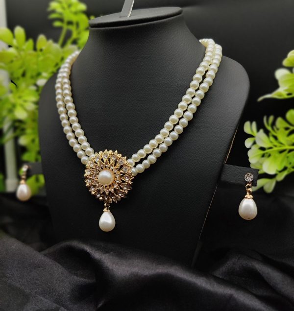 Imported Radiant Double-layered Pearl Necklace With Golden Sunburst Pendant